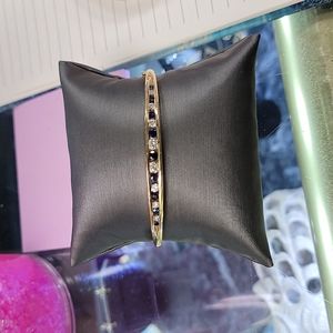 14k yellow gold with diamonds and sapphire